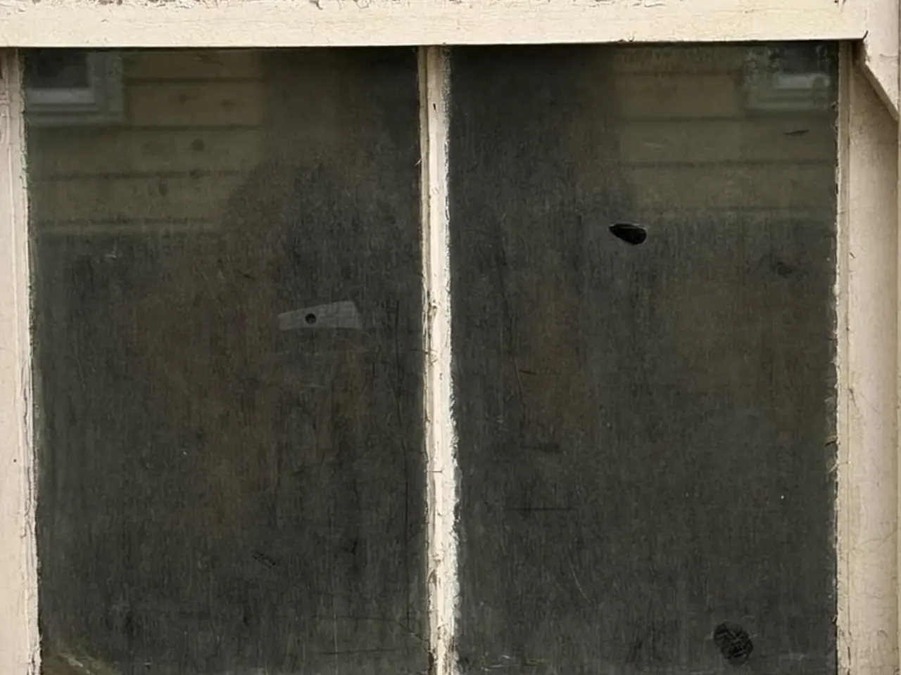 Close-up of a perished window seal leaving a visible draught gap in the frame