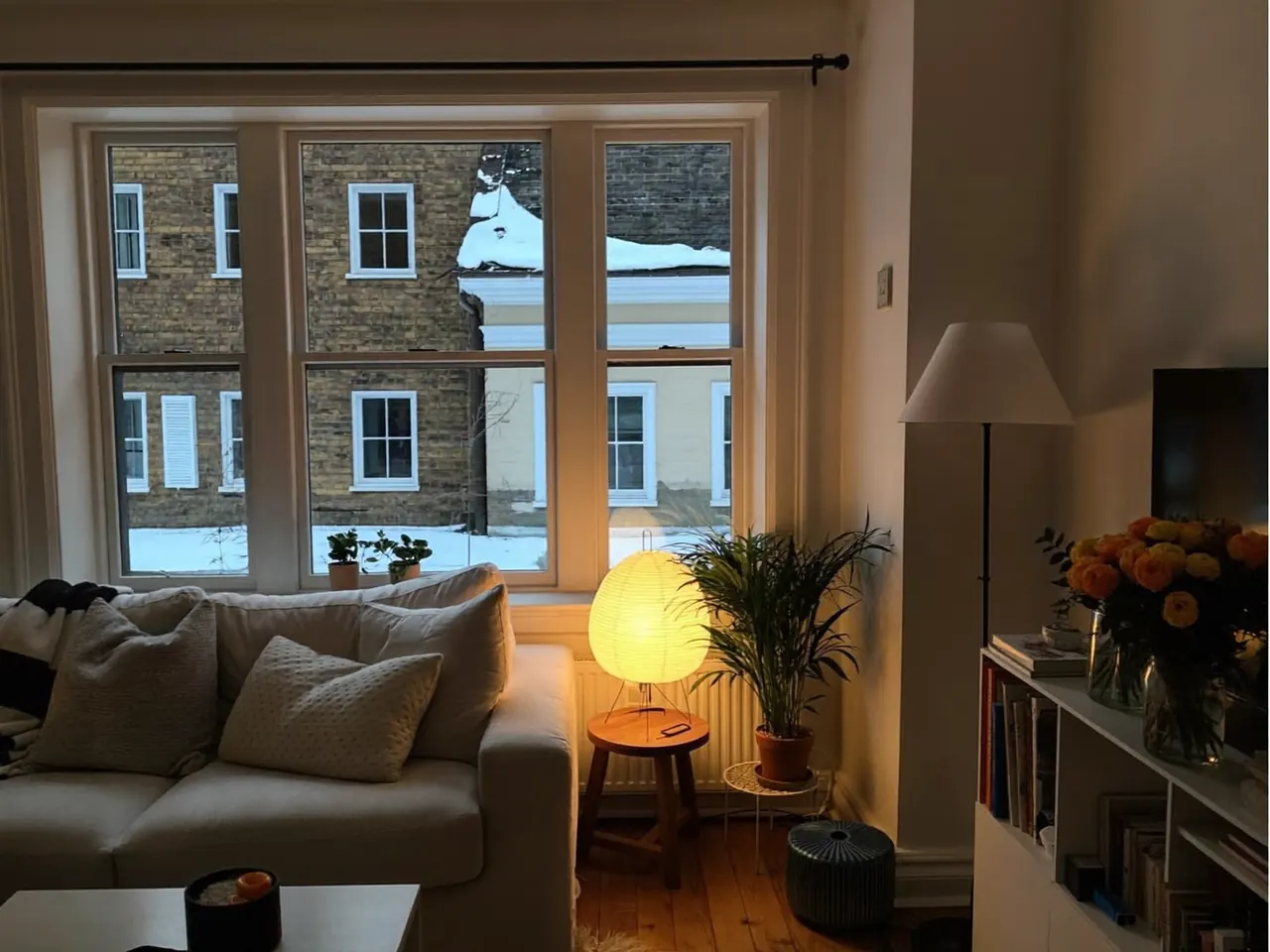 Warm, comfortable living room with newly fitted energy-efficient windows on a winter day